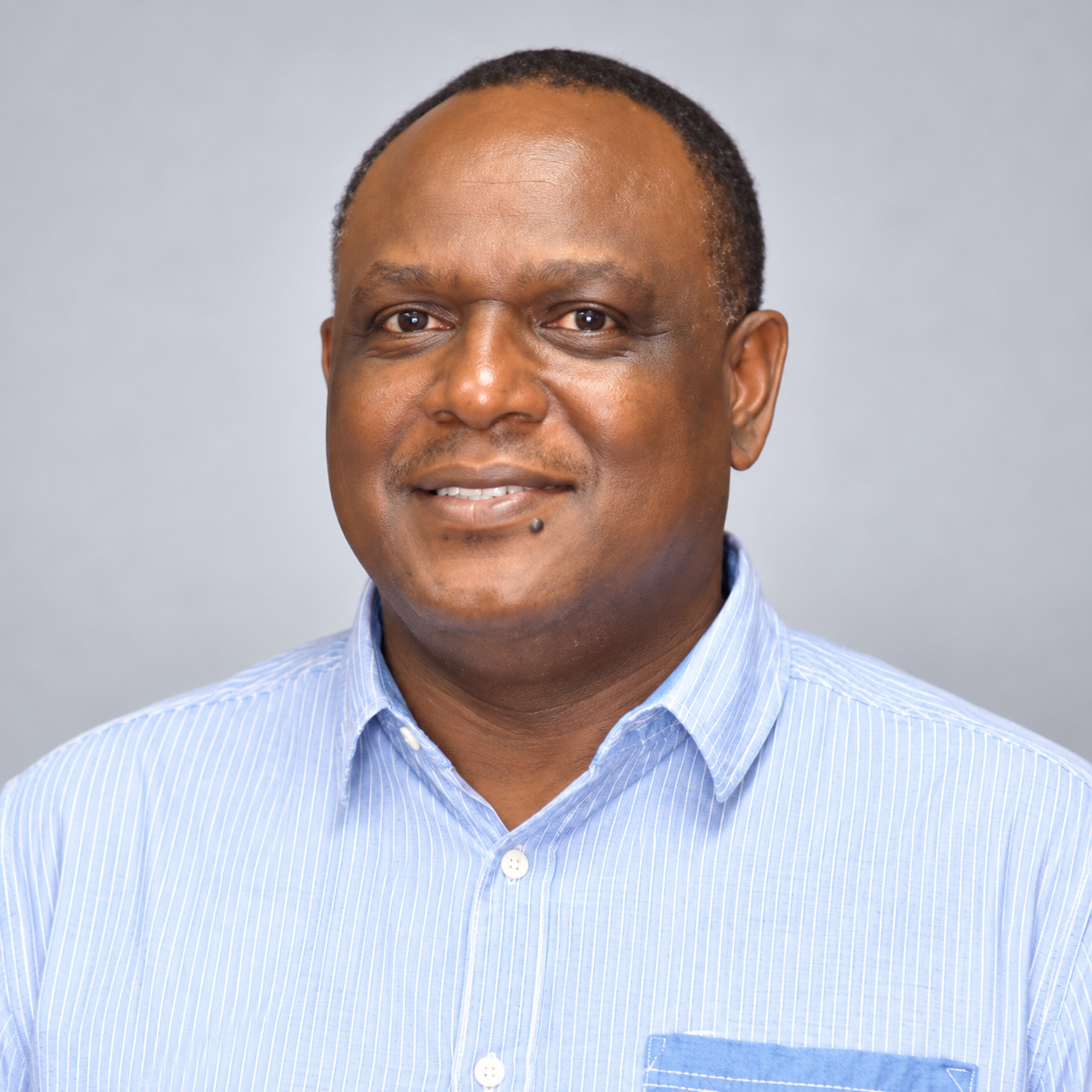 Dr. Alfred J. Mwambela