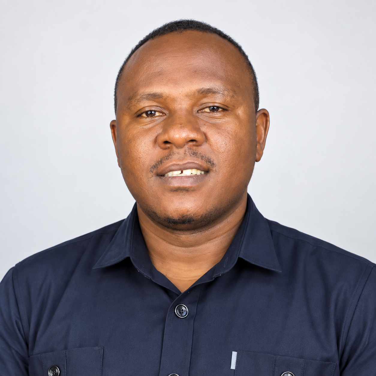 Mr Justine J. Mfugale